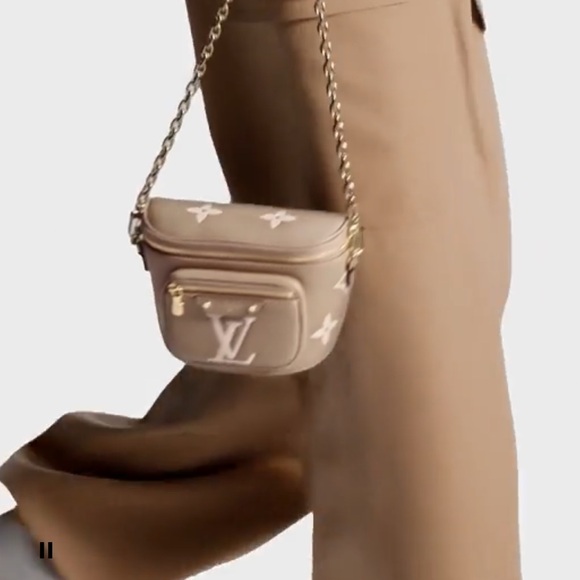 Brand new Louis Vuitton mini bumbag in bicolor monogram empreinte leather. - Picture 2 of 16
